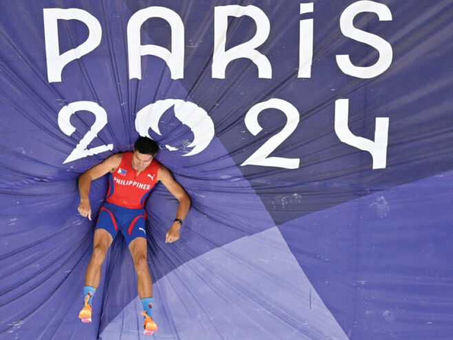 Ernest John Obiena competes in the men's pole vault finals of the athletics event at the Paris 2024 Olympic Games at Stade de France in Saint-Denis, north of Paris, on Monday. Antonin Thuillier, AFP/file